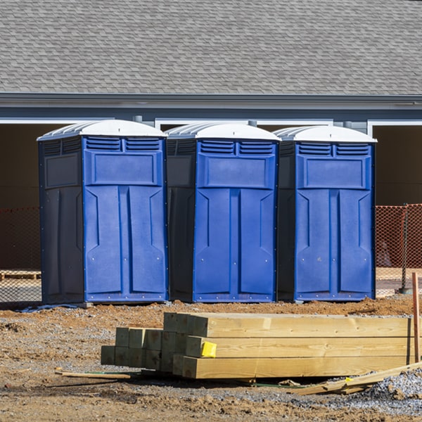 what is the cost difference between standard and deluxe portable toilet rentals in Bouton Iowa